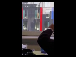 Couple sex against hotel window