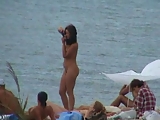 Topless Woman on the Beach