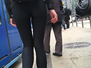 Girl wearing black leggings nice butt