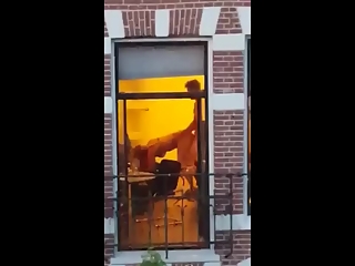 Couple fucking open curtains