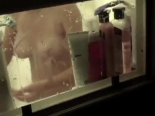 Window peeping on teen showering