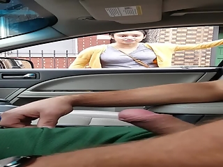 Exhibitionist dude plays with his penis inside car