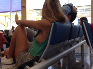 Blonde side boob in airport